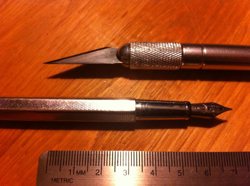 Photo by Ian Campbell of an X-Acto knife, fountain pen, and metric ruler.